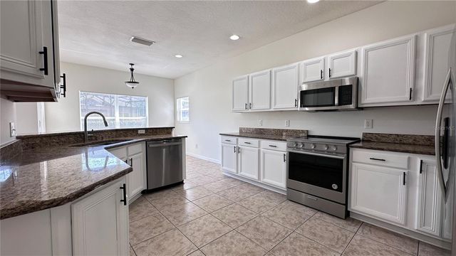 1320 OSPREY COVE COURT, Orlando, FL 32837