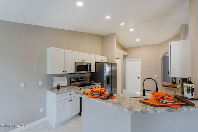 9 Slipper Flower Path E, Palm Coast, FL 32164