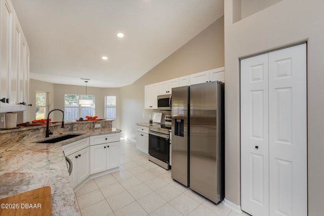 9 Slipper Flower Path E, Palm Coast, FL 32164