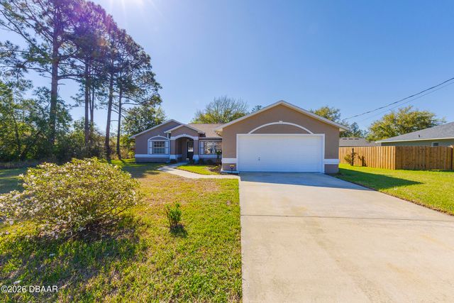 9 Slipper Flower Path E, Palm Coast, FL 32164