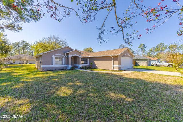 9 Slipper Flower Path E, Palm Coast, FL 32164