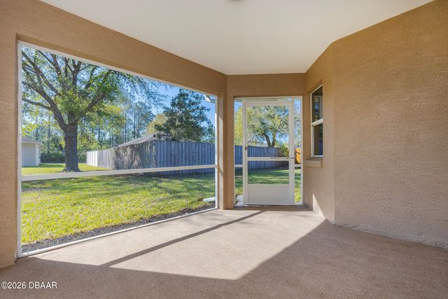 9 Slipper Flower Path E, Palm Coast, FL 32164