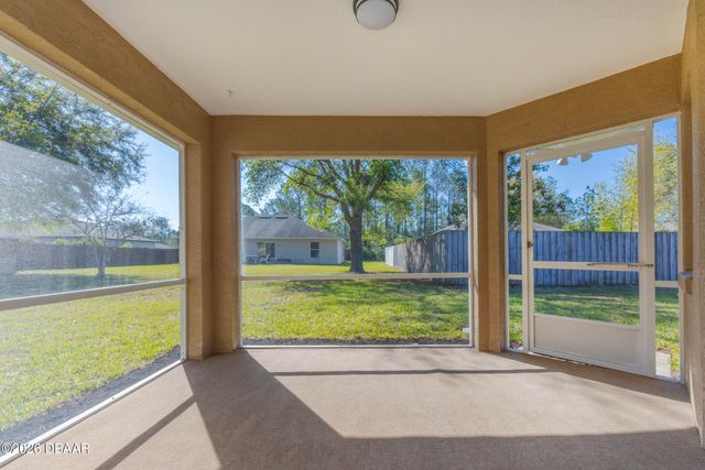 9 Slipper Flower Path E, Palm Coast, FL 32164