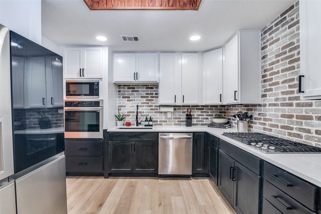 2209 Vicksburg Drive, Sachse, TX 75048