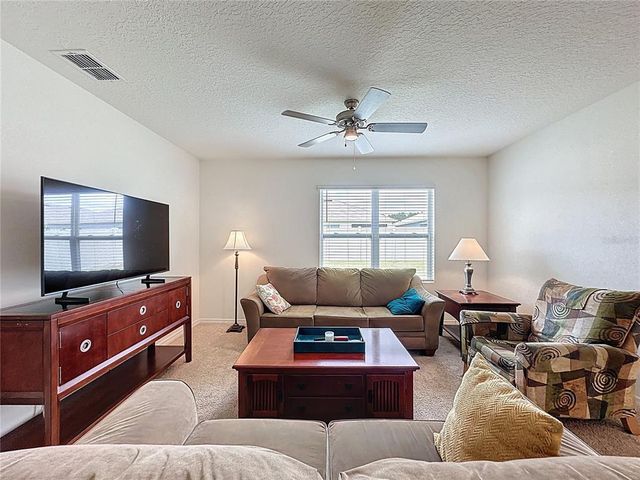 1262 IGUANA LOOP, Davenport, FL 33897