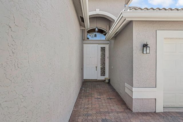 7775 Ocean Sunset Drive, Lake Worth, FL 33467