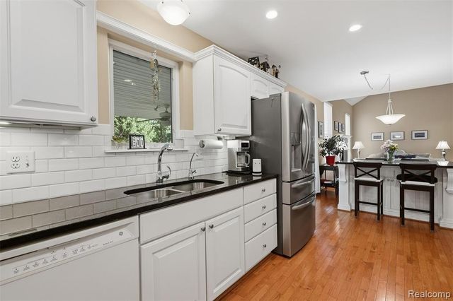 4909 Yax Pointe Drive, Howell, MI 48843
