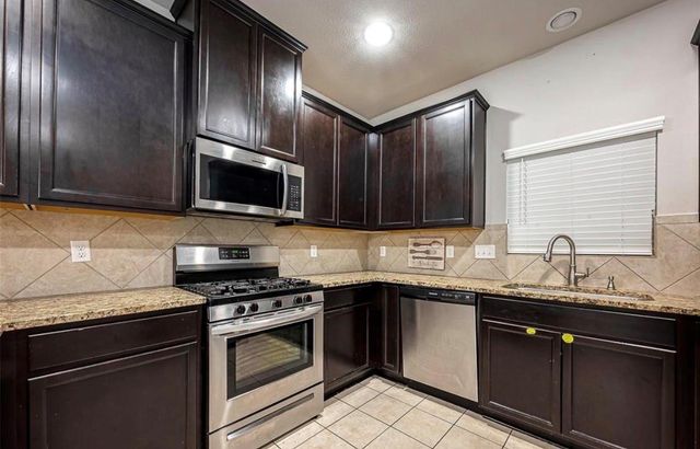 6409 Hollock Meadows Lane, Houston, TX 77048
