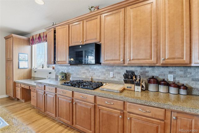 6875 S Buchanan Court, Aurora, CO 80016