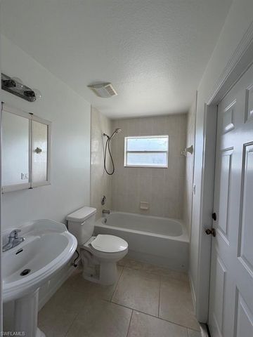 573 Bourse CIR, Lehigh Acres, FL 33974
