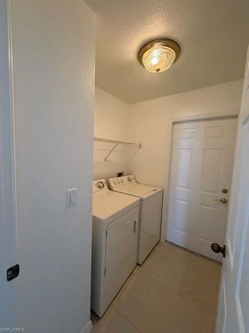 573 Bourse CIR, Lehigh Acres, FL 33974