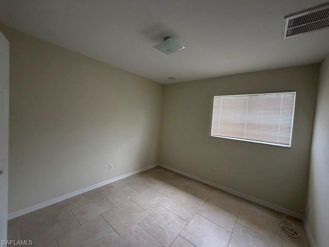 573 Bourse CIR, Lehigh Acres, FL 33974