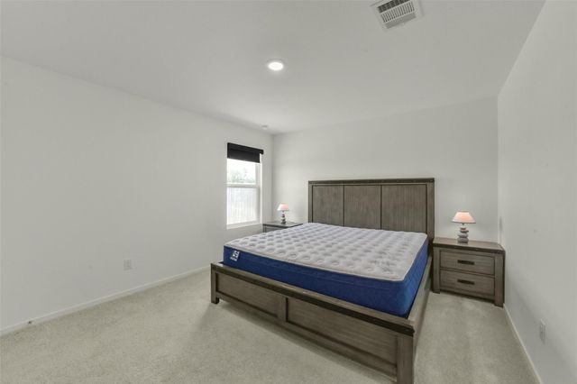 911 Lago Laceno Lane, Huffman, TX 77336