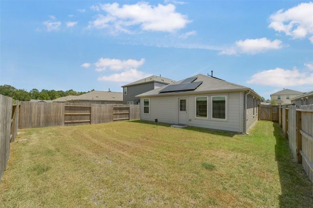 911 Lago Laceno Lane, Huffman, TX 77336