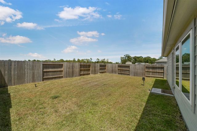911 Lago Laceno Lane, Huffman, TX 77336