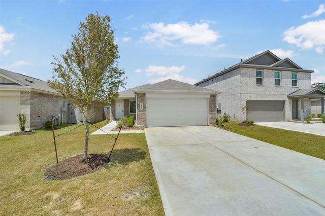 911 Lago Laceno Lane, Huffman, TX 77336