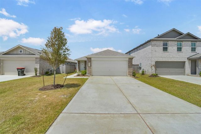 911 Lago Laceno Lane, Huffman, TX 77336