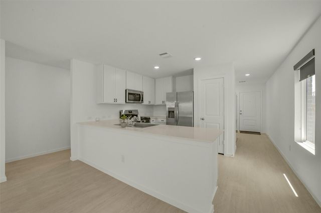 911 Lago Laceno Lane, Huffman, TX 77336