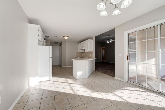 720 E Elder Lane, Mustang, OK 73064