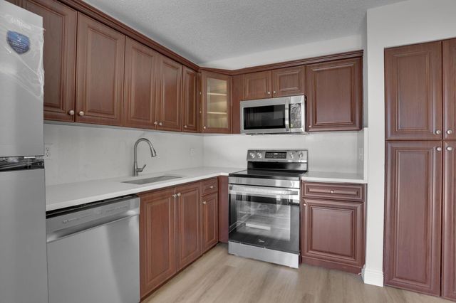 240 Woodland Road, Palm Springs, FL 33461