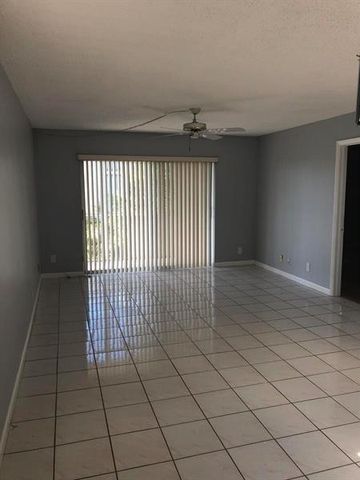 8735 Ramblewood Drive 409, Coral Springs, FL 33071