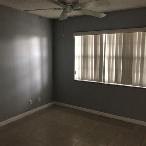 8735 Ramblewood Drive 409, Coral Springs, FL 33071