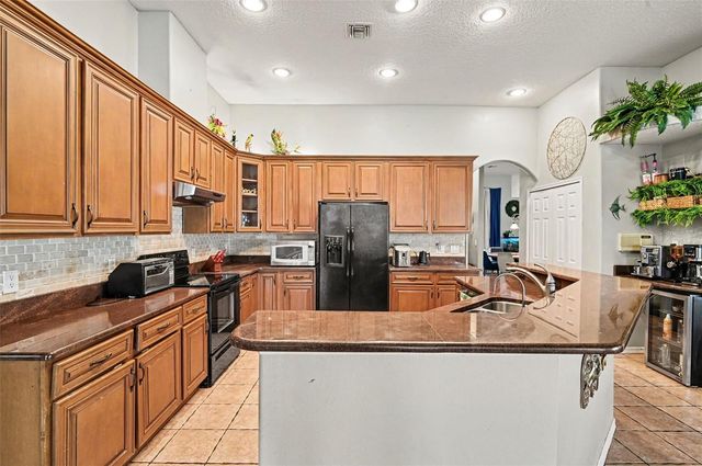 1325 TALL MAPLE LOOP, Oviedo, FL 32765