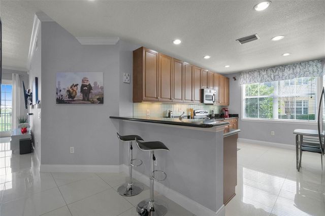 7468 EXCITEMENT DRIVE 102, Reunion, FL 34747