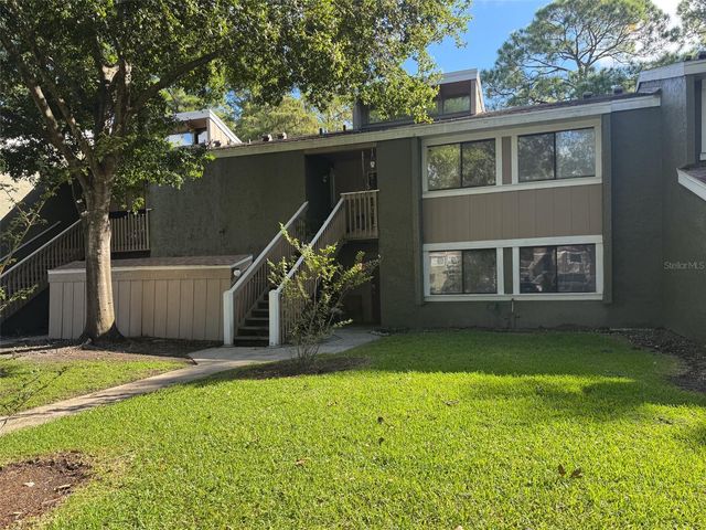 5885 WINDHOVER DRIVE 4E, Orlando, FL 32819