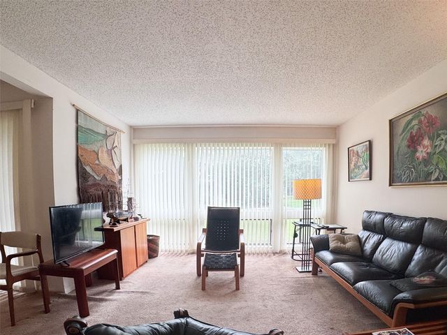 5885 WINDHOVER DRIVE 4E, Orlando, FL 32819