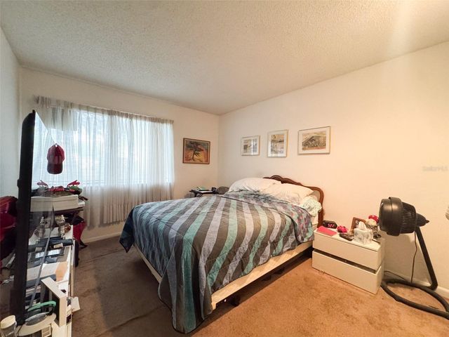 5885 WINDHOVER DRIVE 4E, Orlando, FL 32819