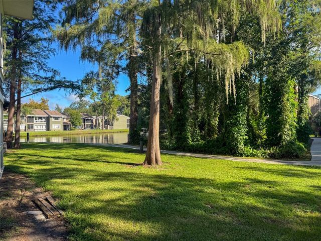 5885 WINDHOVER DRIVE 4E, Orlando, FL 32819