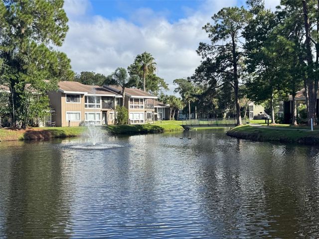 5885 WINDHOVER DRIVE 4E, Orlando, FL 32819