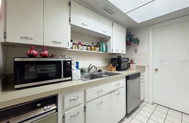 5885 WINDHOVER DRIVE 4E, Orlando, FL 32819