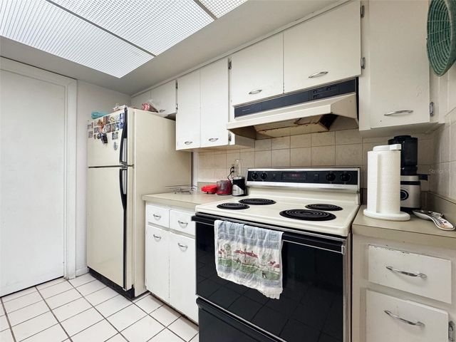 5885 WINDHOVER DRIVE 4E, Orlando, FL 32819