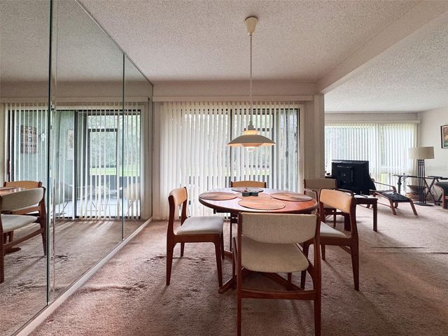 5885 WINDHOVER DRIVE 4E, Orlando, FL 32819