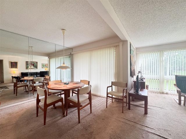 5885 WINDHOVER DRIVE 4E, Orlando, FL 32819