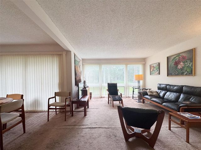5885 WINDHOVER DRIVE 4E, Orlando, FL 32819