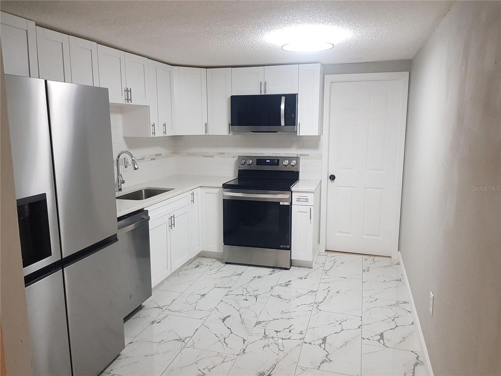 Image 39 of property listing at 311 58TH AVENUE E, Bradenton, FL 34203