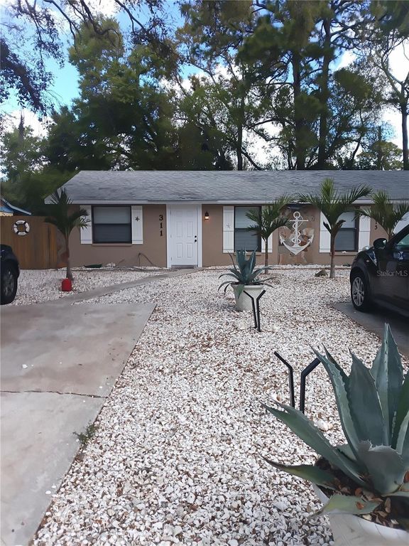 Image 99 of property listing at 311 58TH AVENUE E, Bradenton, FL 34203