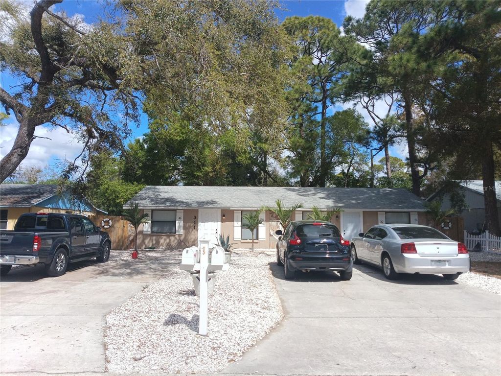 Image 100 of property listing at 311 58TH AVENUE E, Bradenton, FL 34203