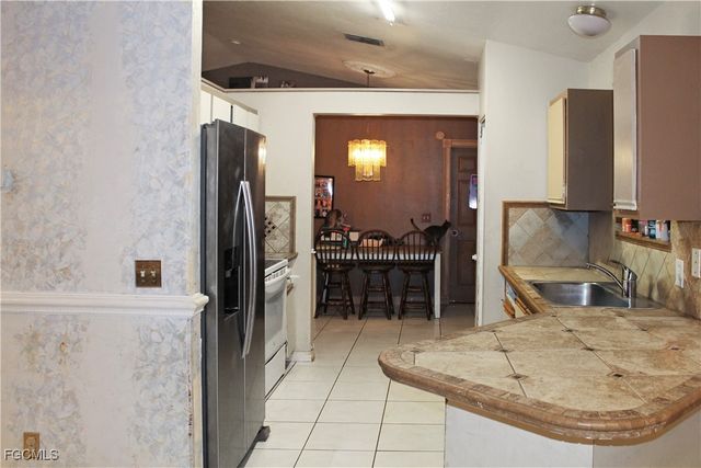 902 Clayton AVE, Lehigh Acres, FL 33972