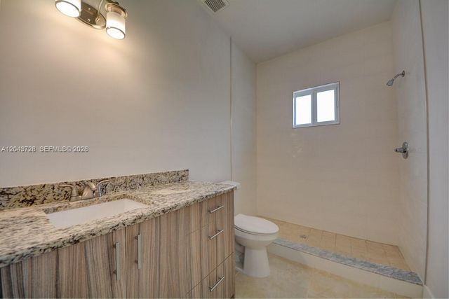 312 Phippen Waiters Rd, Dania Beach, FL 33004
