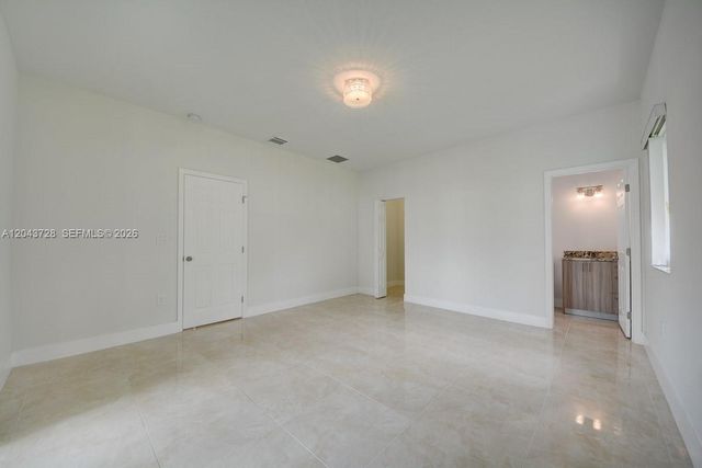 312 Phippen Waiters Rd, Dania Beach, FL 33004