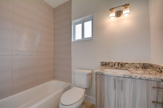 312 Phippen Waiters Rd, Dania Beach, FL 33004