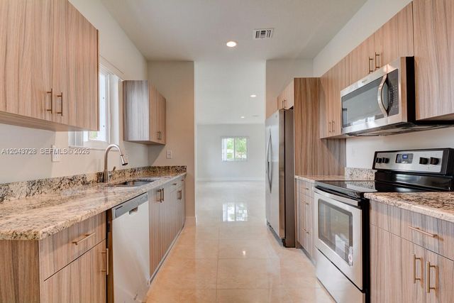 312 Phippen Waiters Rd, Dania Beach, FL 33004