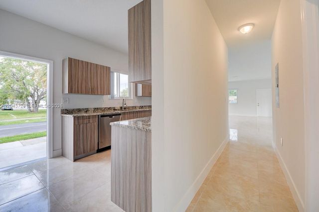 312 Phippen Waiters Rd, Dania Beach, FL 33004