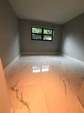 9150 NW 38th Drive 106, Coral Springs, FL 33065