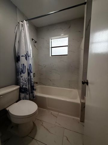 9150 NW 38th Drive 106, Coral Springs, FL 33065