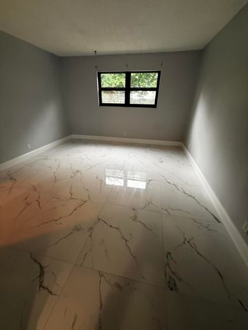 9150 NW 38th Drive 106, Coral Springs, FL 33065